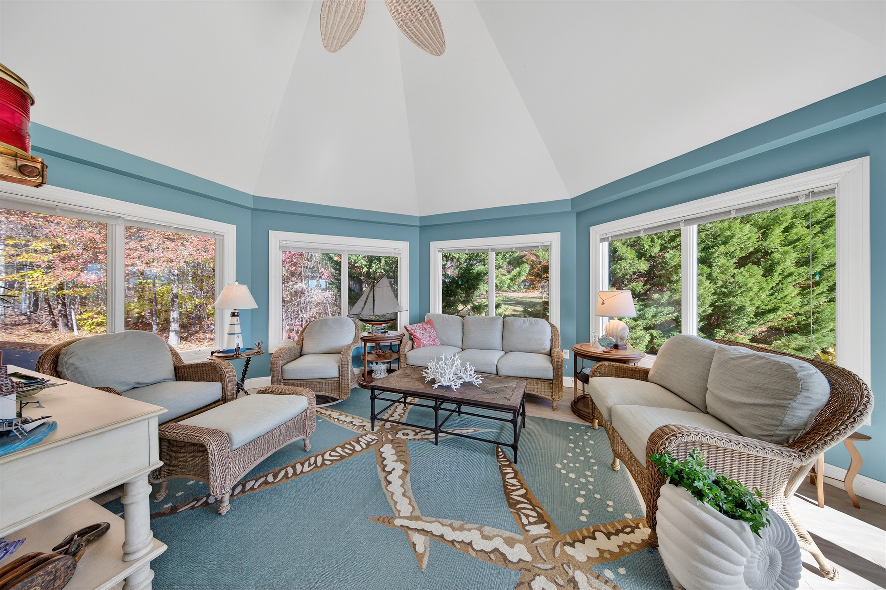 Enjoy panoramic views of the lake and wooded landscape from every seat.