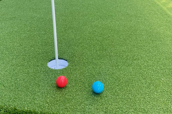 A small putting green outside for family fun