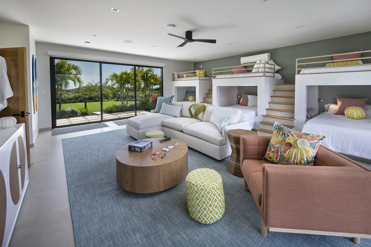 Bunk Room. bedroom 5, with 3 bunk beds - 6 beds total. The size of the mattresses on the bunk beds are double beds. They are perfect for two kids per bed or one adult.