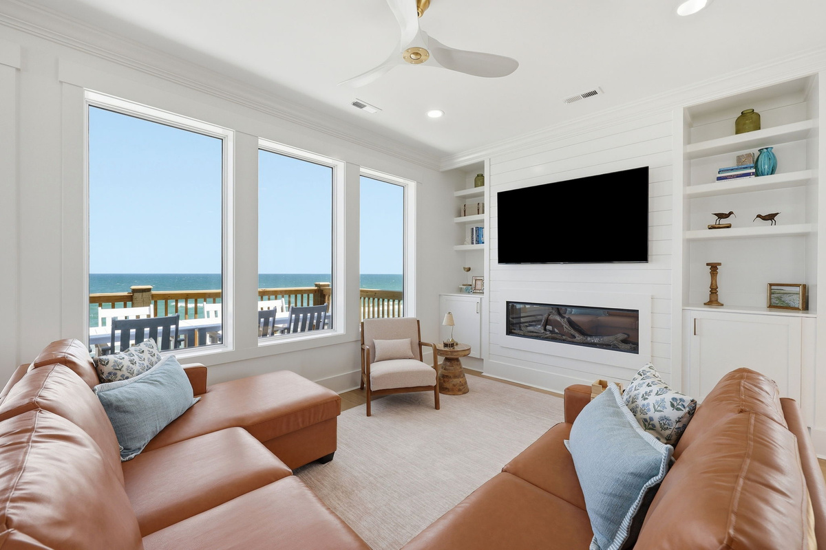 Panoramic ocean views from the living space designed for gathering and relaxing in comfort
