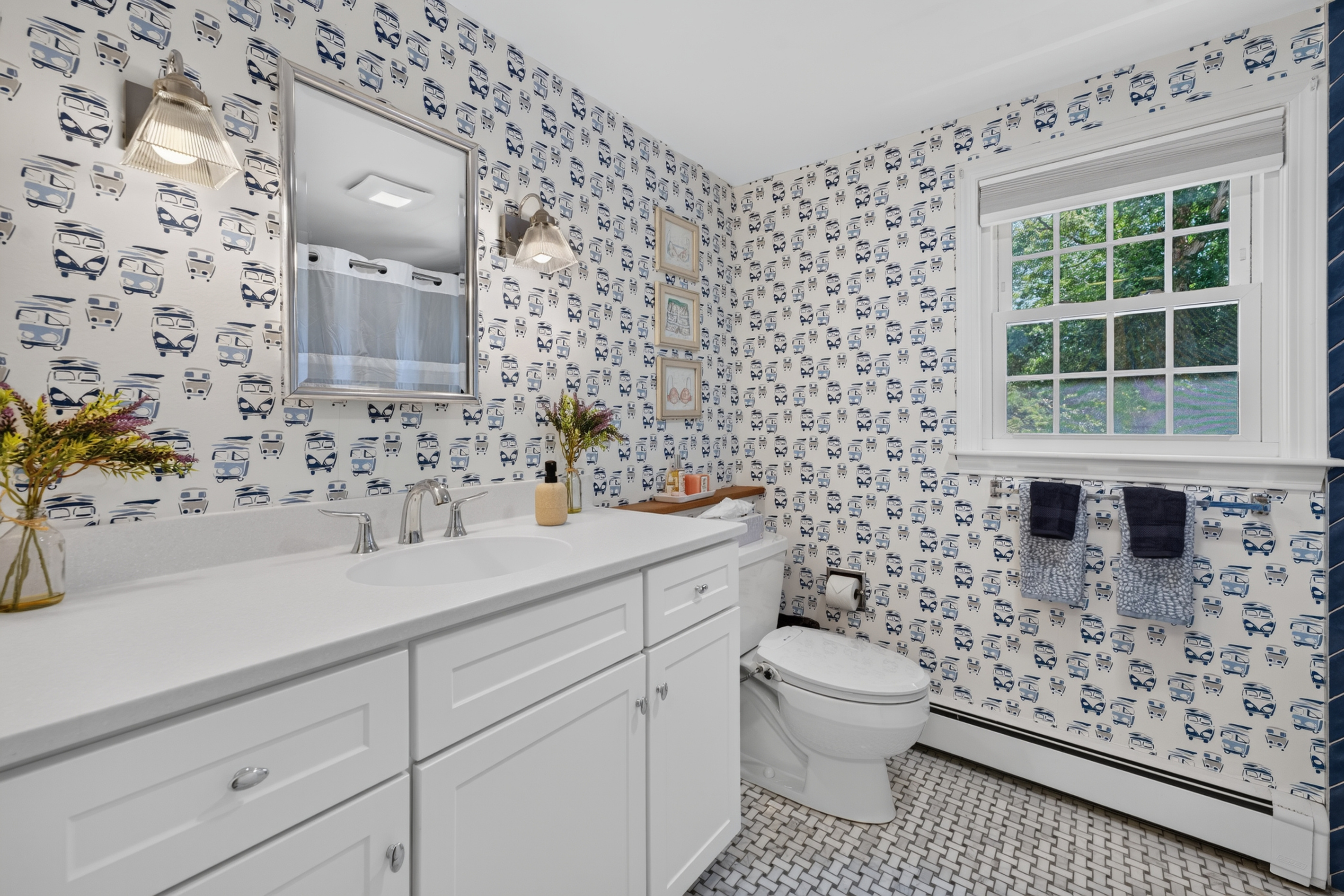 Spacious full bathroom with a double vanity for added convenience.
