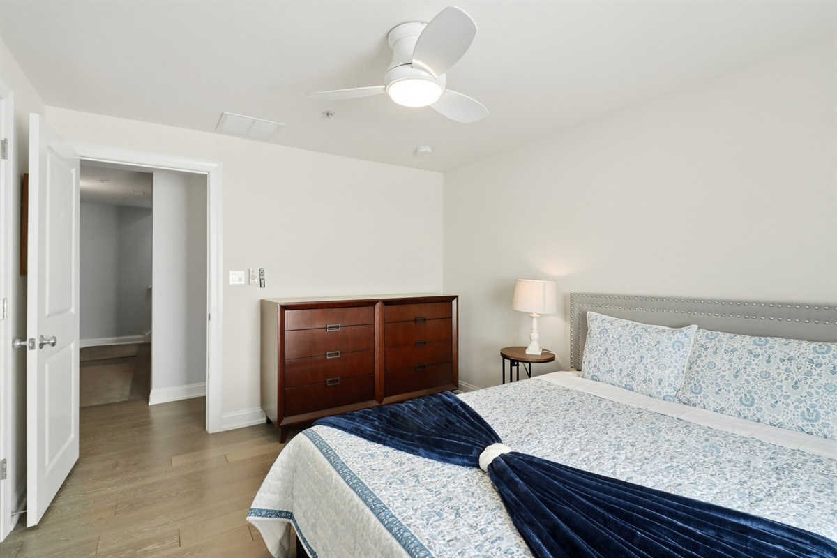 Spacious bedroom with a queen bed for 2.