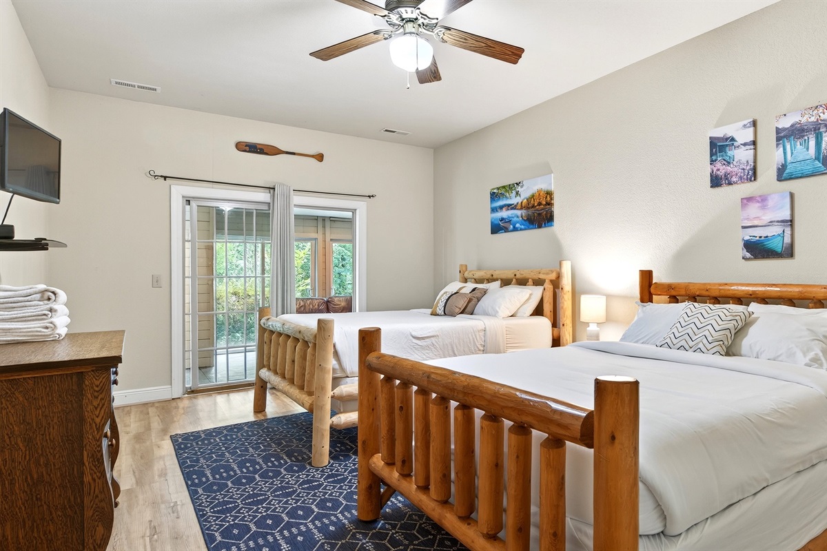 Lower level bedroom with two queen beds