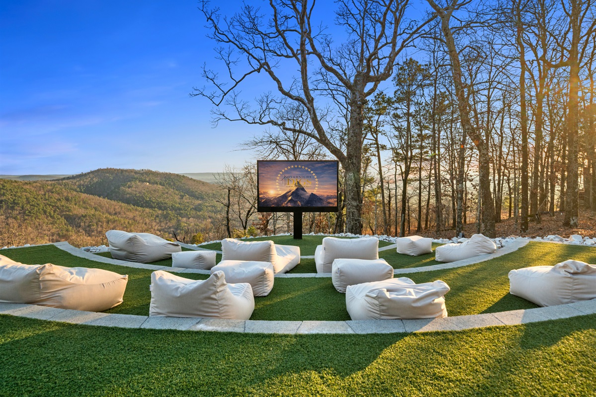 Surrounded by trees and wide-open scenery, this outdoor lounge setup feels like your own private spot to relax, unwind, and take it all in.