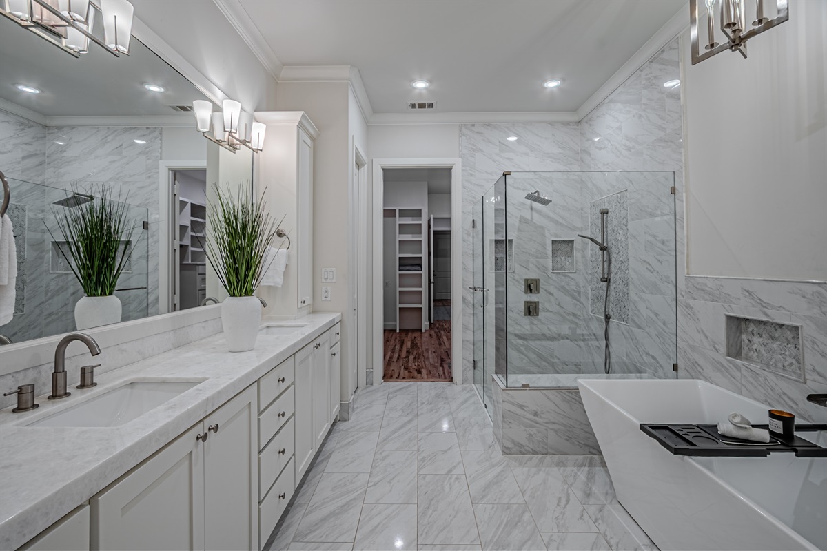 Spa-style primary bathroom with modern finishes