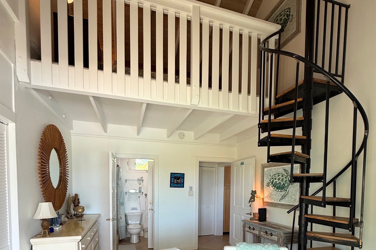 The loft is fitted with a queen bed