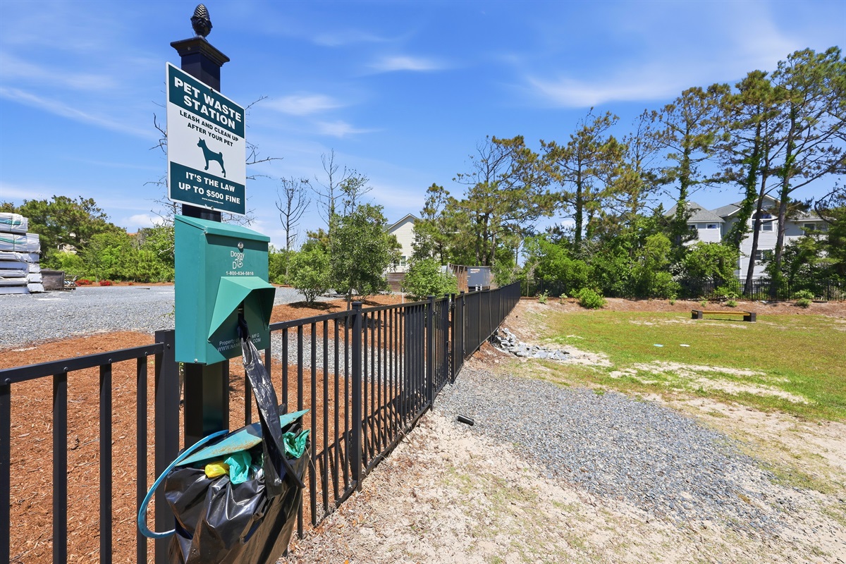 Dog park with waste station and fenced area