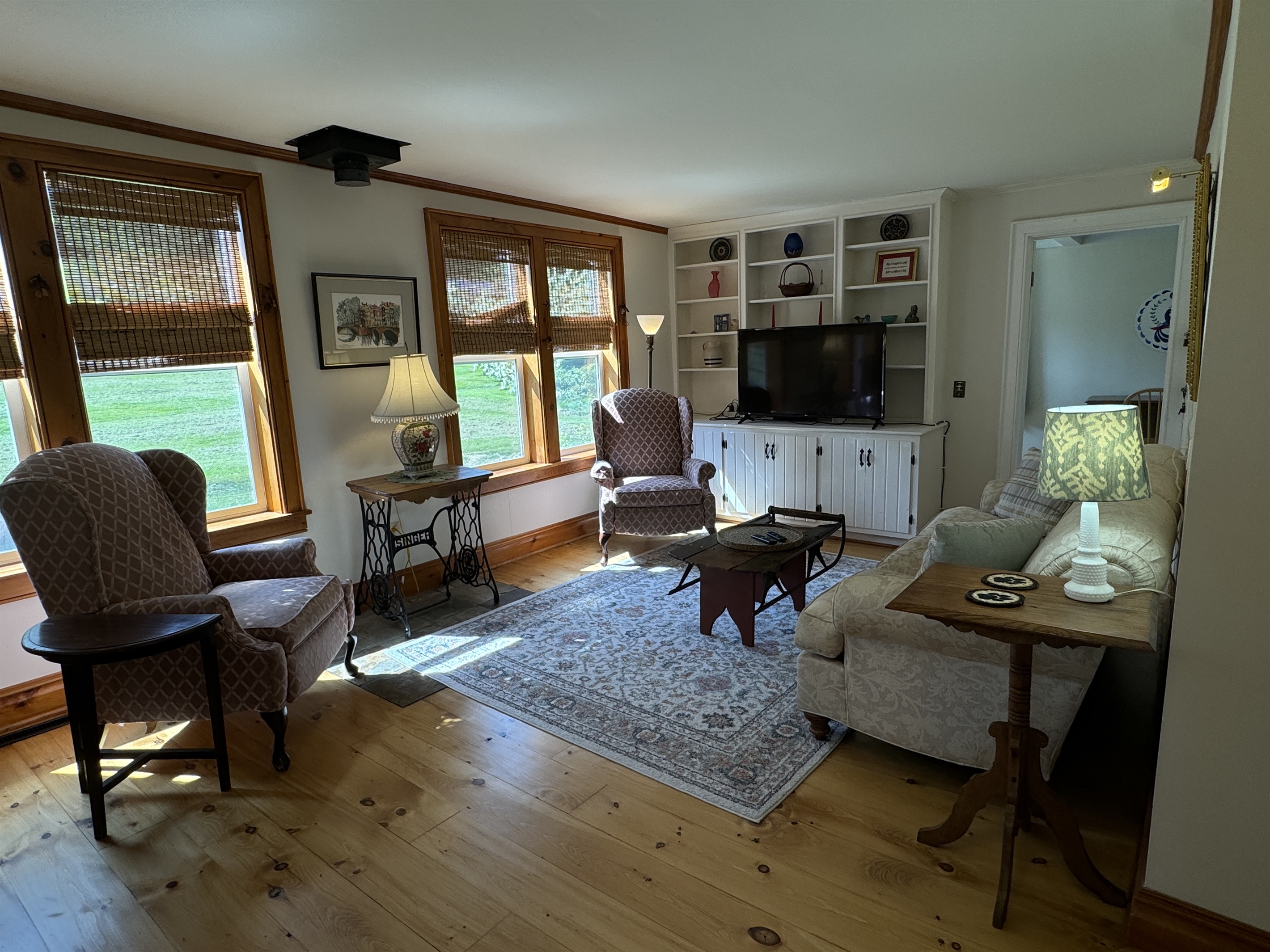 Living room with Queen bedroom in back right