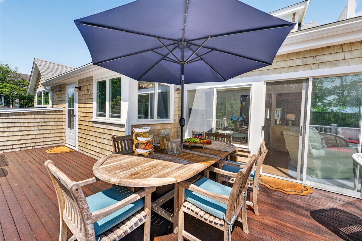 Comfortable outdoor furniture provides the perfect spot to relax and enjoy the fresh coastal air.