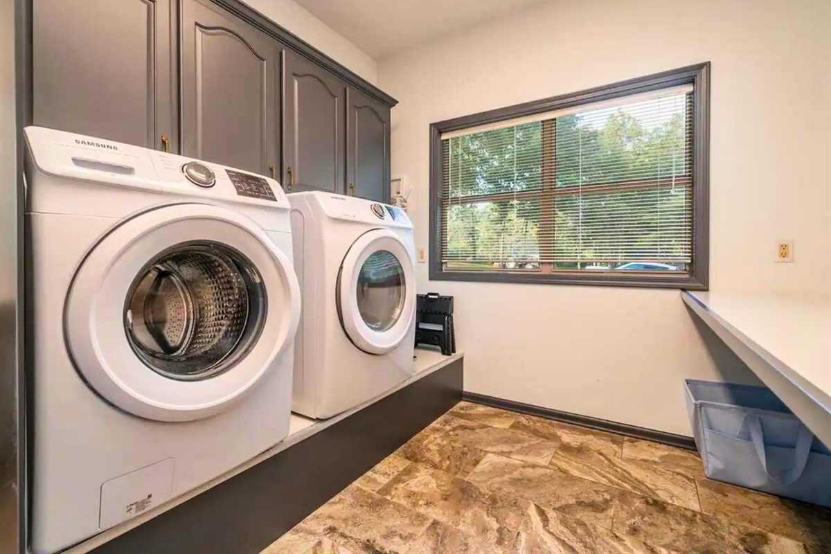 Lower Level - Laundry Room with Front Load Washer and Dryer