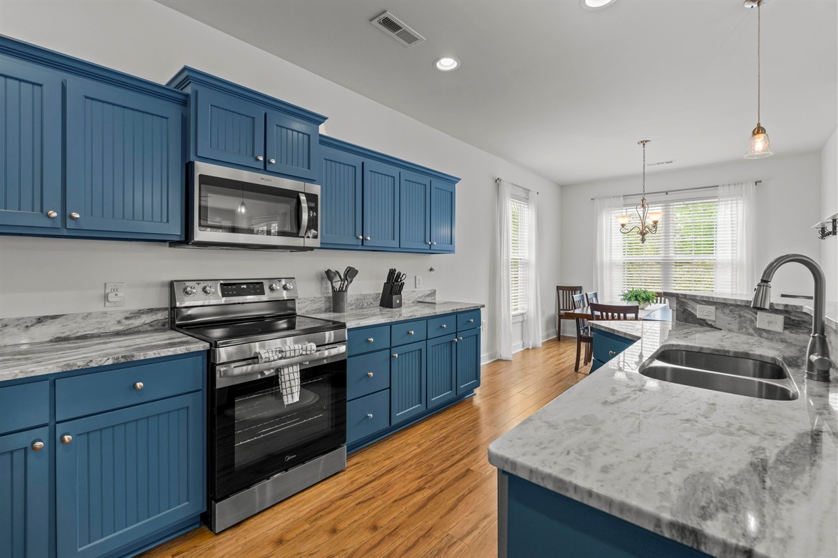 Enjoy cooking in the large kitchen with beautiful granite and stainless steel appliances