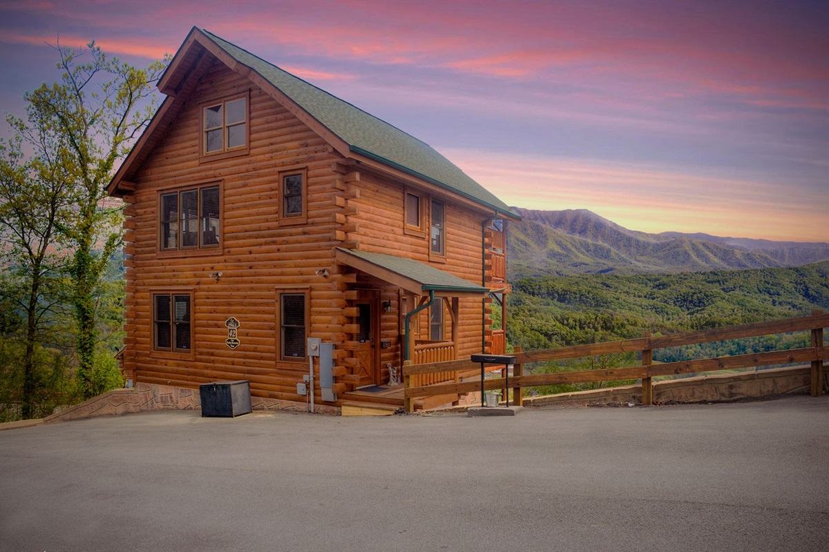 - Charming log cabin surrounded by breathtaking Smoky Mountain views   - Perfect blend of rustic charm and modern comfort for your mountain escape   - Capture sunrise colors painting the peaks from your private retreat