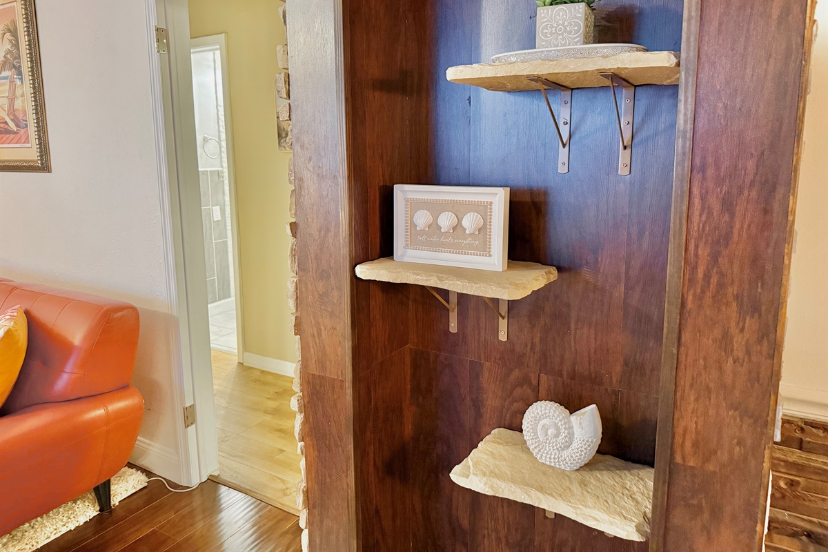 Bright pops of color and warm textures make this the perfect space to unwind after a day at the beach or enjoy a quiet evening in.