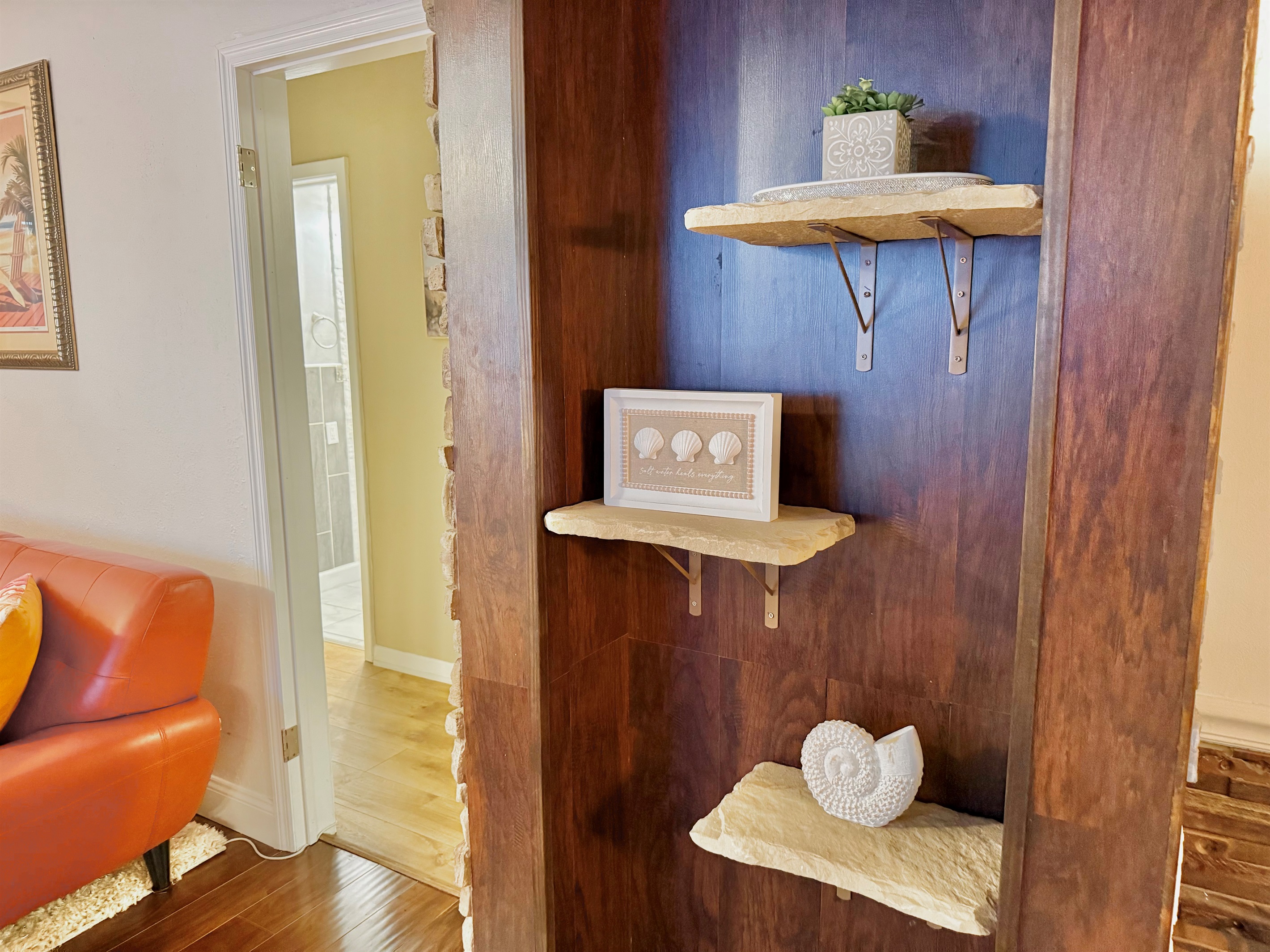 Bright pops of color and warm textures make this the perfect space to unwind after a day at the beach or enjoy a quiet evening in.