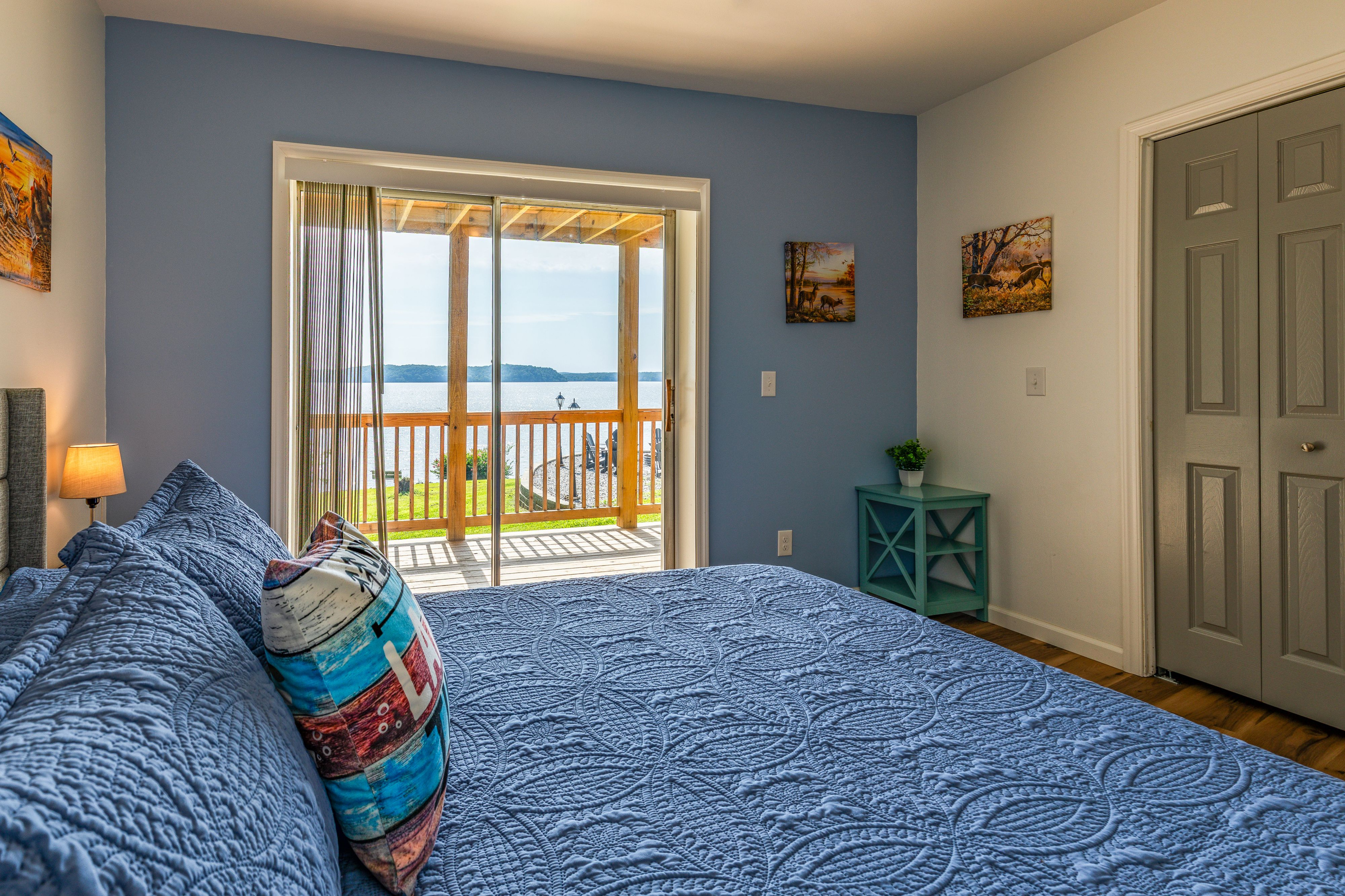 Bedroom 4 opens onto the deck and offers a beautiful view toward Kentucky Lake.