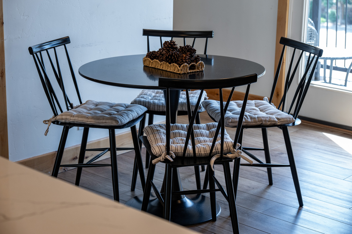A dedicated dining space offers a comfortable place for meals, games, and planning the day’s adventures.