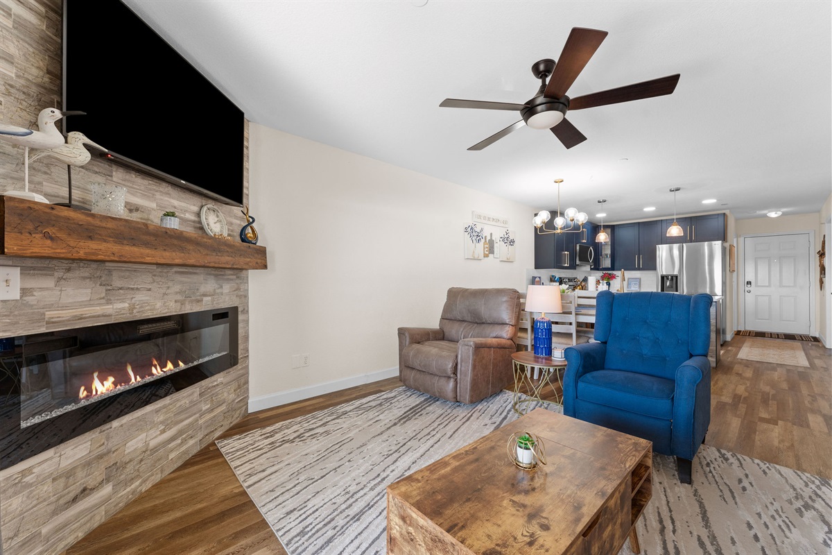 Comfortable seating with balcony access.