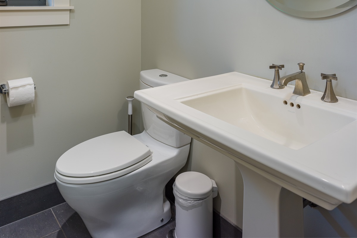 Quick and convenient, this handy powder room keeps everyone refreshed.