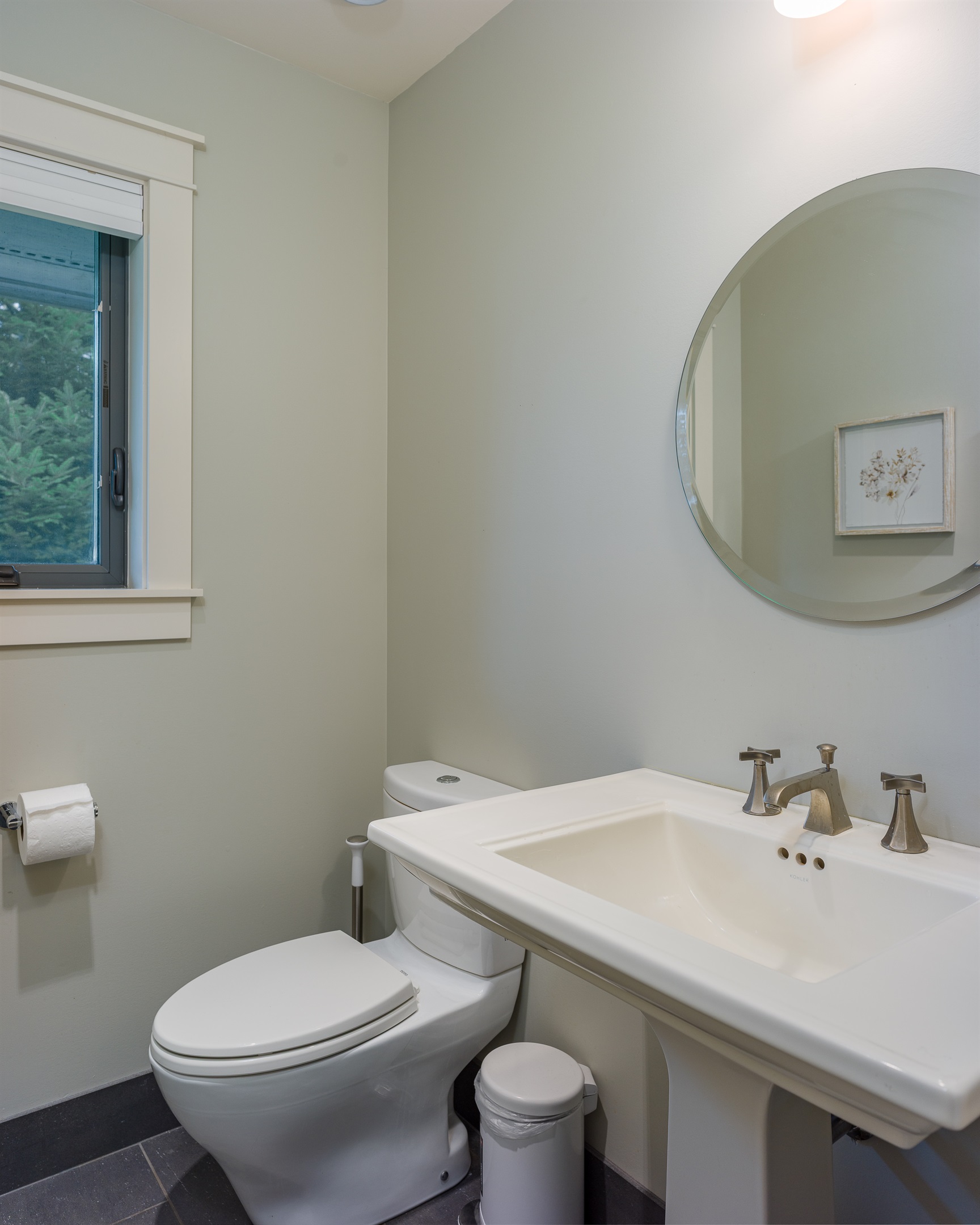 Quick and convenient, this handy powder room keeps everyone refreshed.