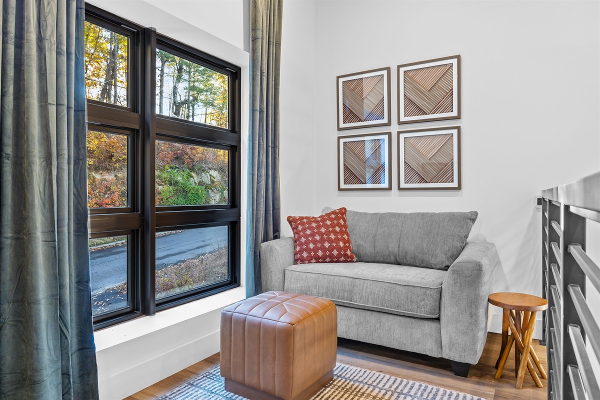 Loft overlooking the great room — cozy and inviting