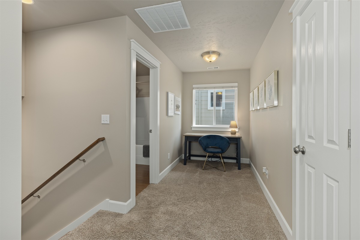 Upstairs loft perfect for work or relaxation.