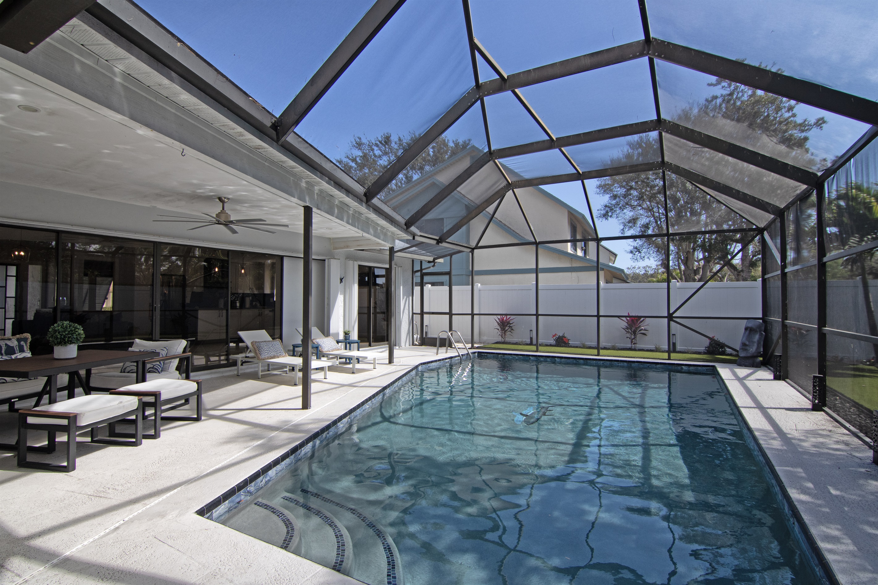 Heated private pool with covered patio area