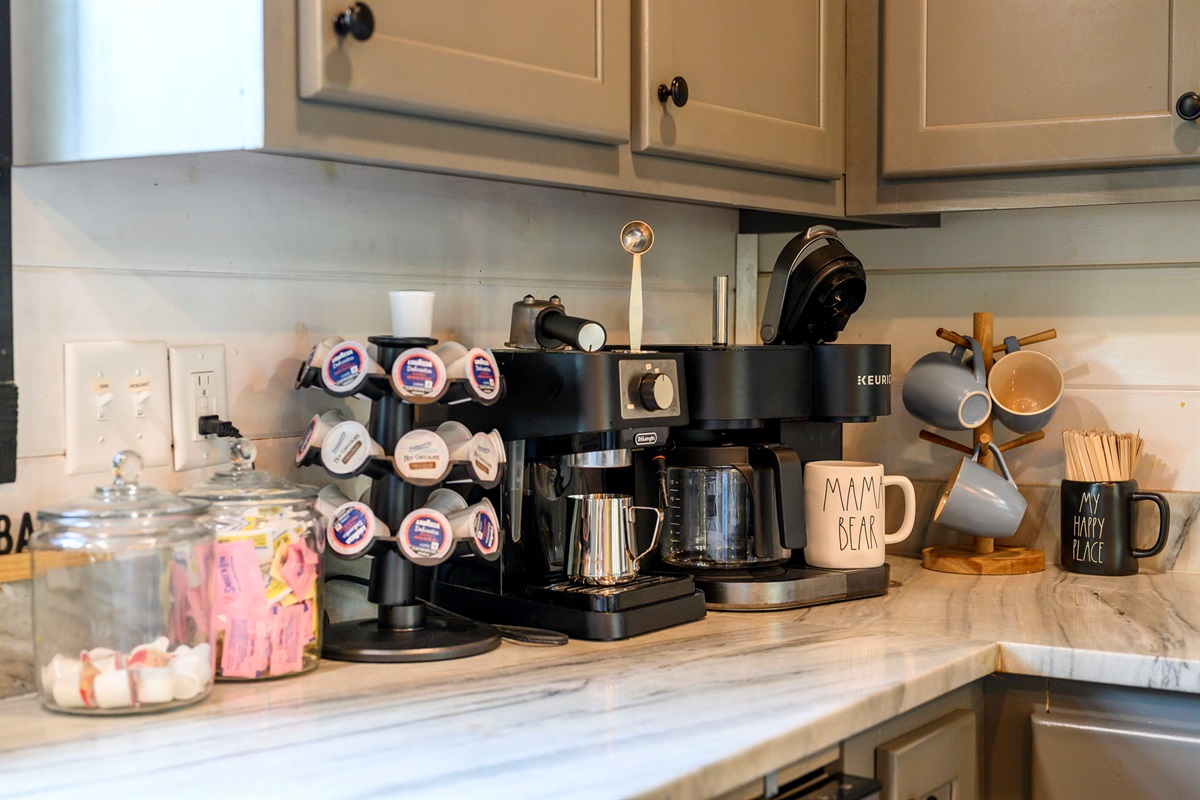 Keurig Duo coffee maker with Kcups provided. Espresso machine is available as well.