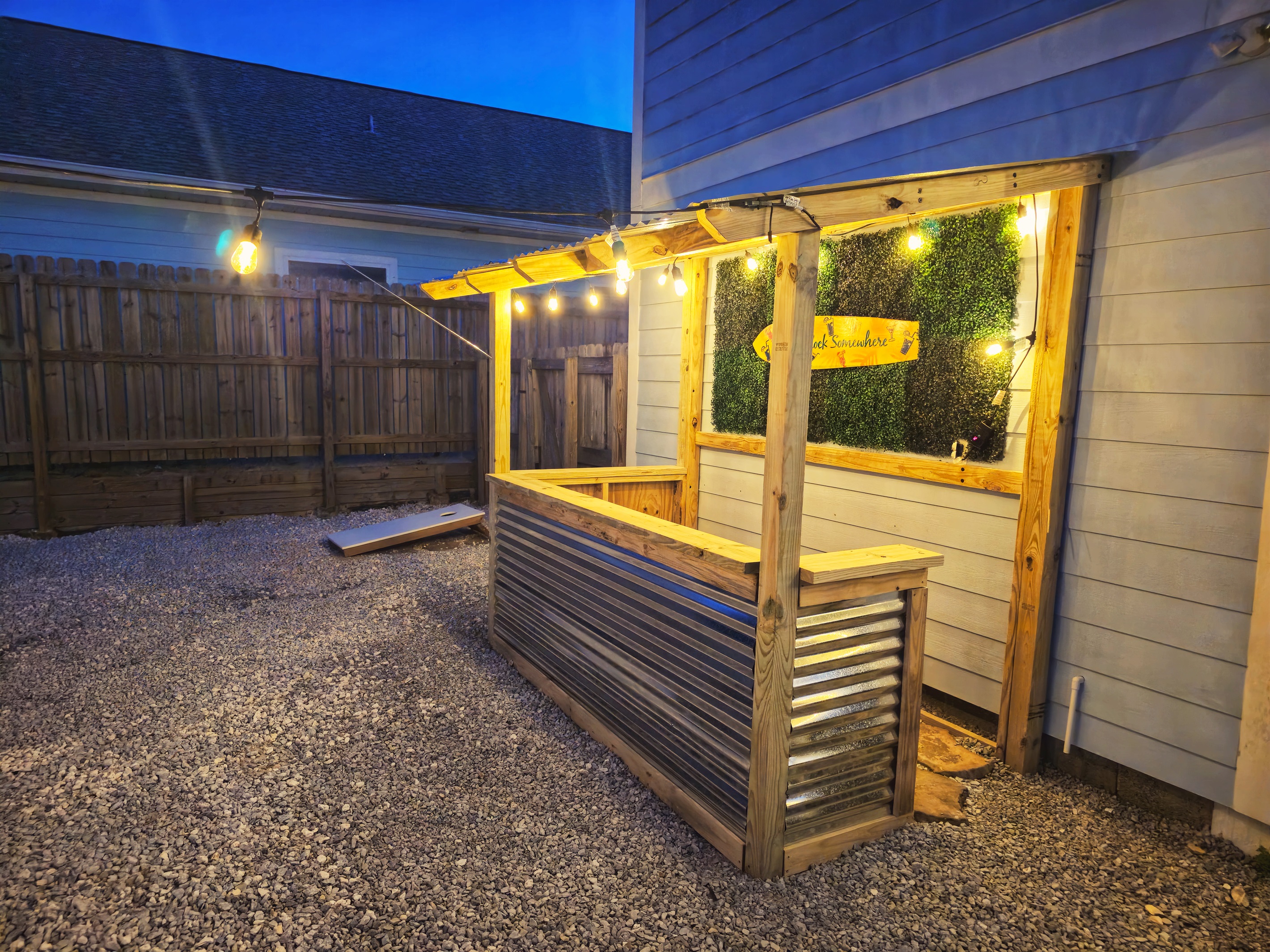 Enjoy a cocktail at the Tiki Bar and challenge your friends in cornhole