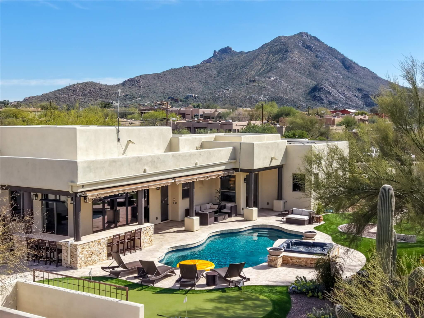 View of the Pool, Hot Tub, Exterior Kitchen / Bar & Mountains