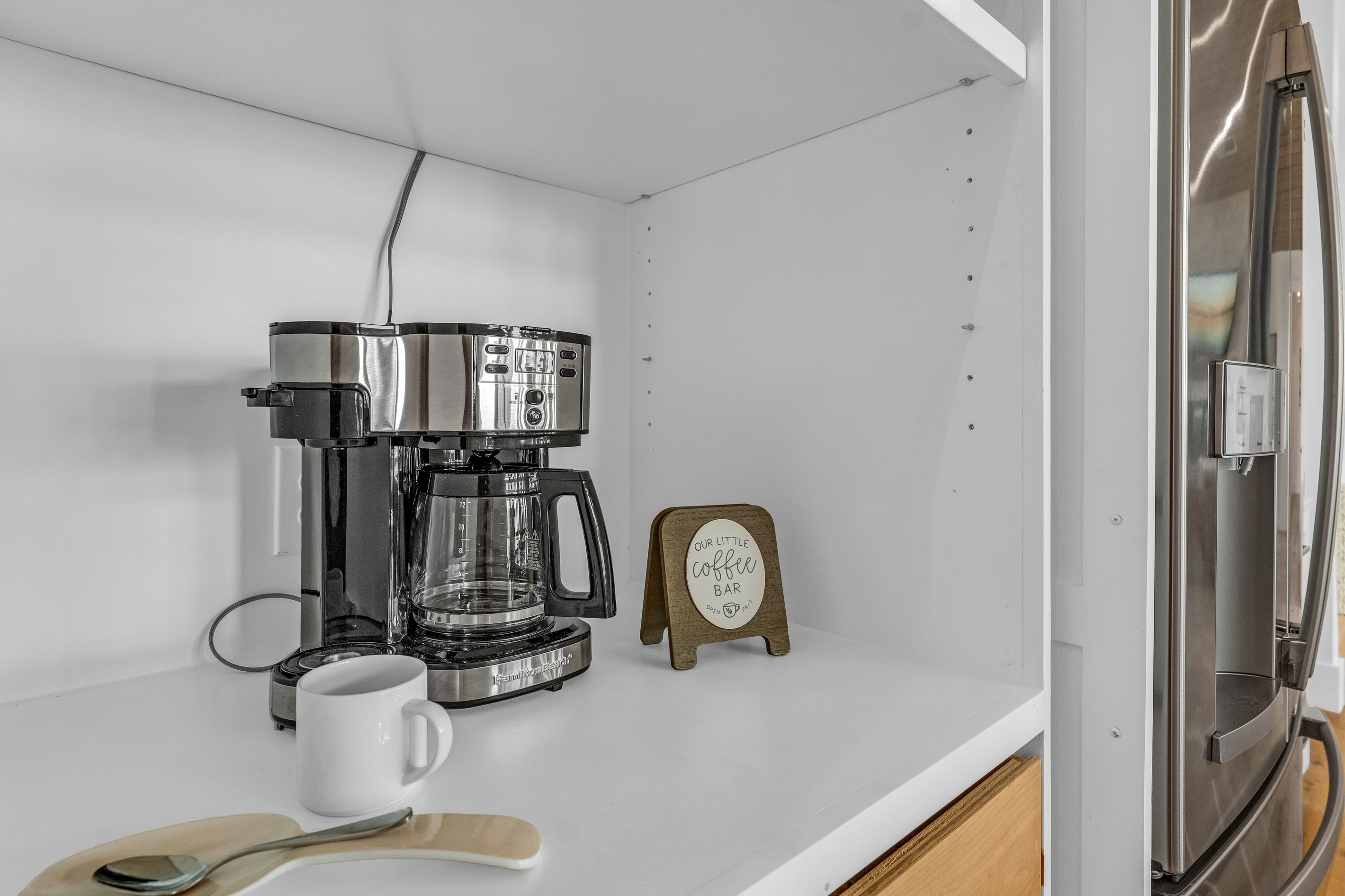 Cair Paravel: A tucked-away coffee station, complete with a two-way brewer and everything needed for a slow morning cup before the beach calls.