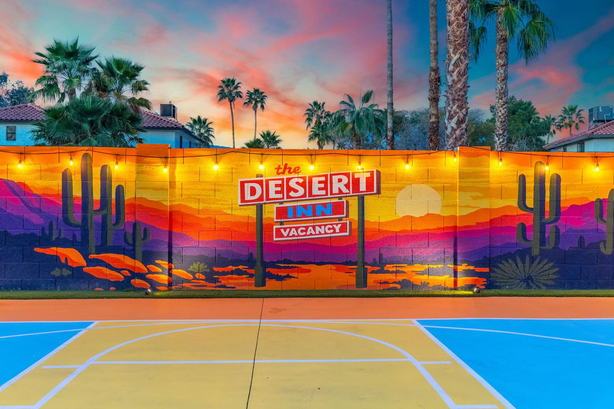 Custom mural makes for the perfect backdrop for capturing photos to remember your vacation!