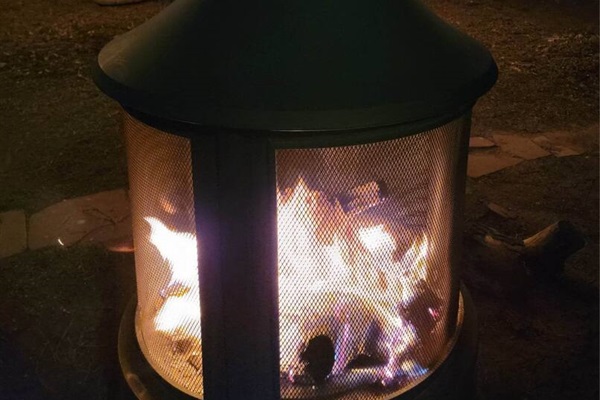 The outdoor firepit is perfect to keep our guests warm at night.