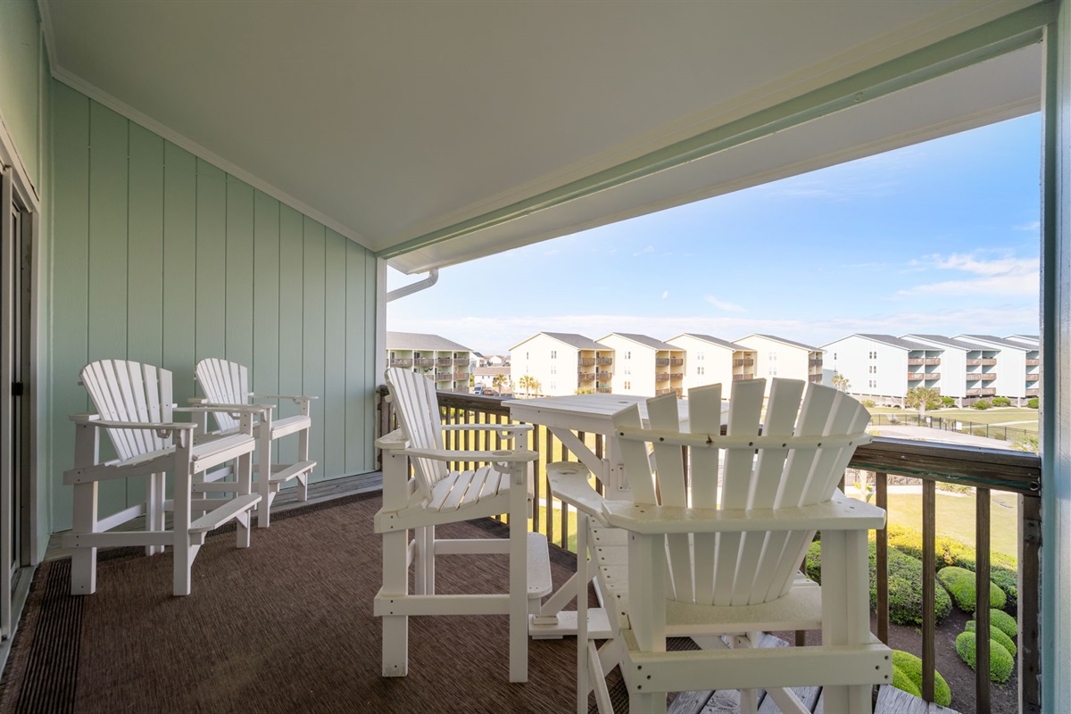 Covered patio provides shade and year-round enjoyment