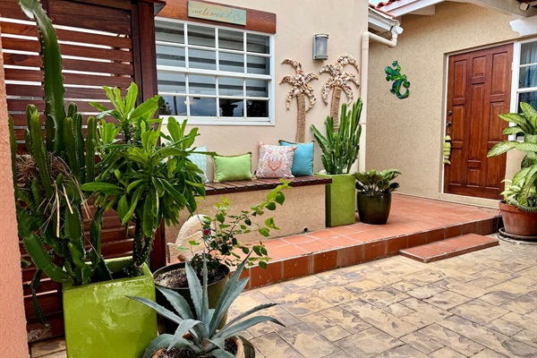 Covered parking area with space for two cars, additional on street parking as well.