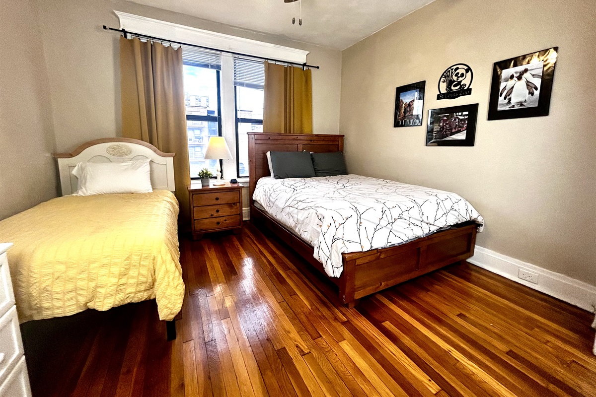 2nd bedroom sleeps 3 in a twin and queen + roll-away bed.
