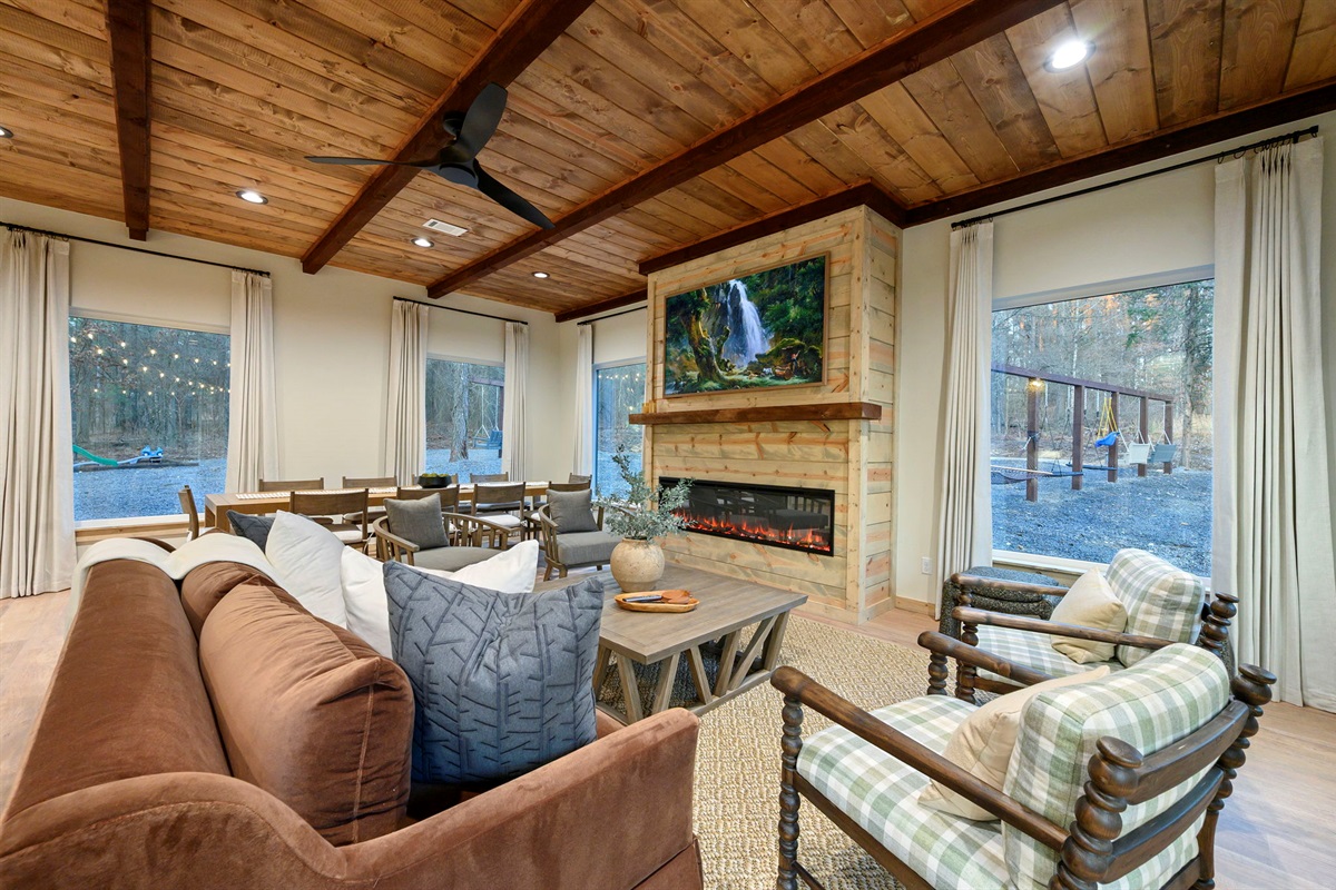 Comfortable seating with beautiful wooded views from every window 🌲