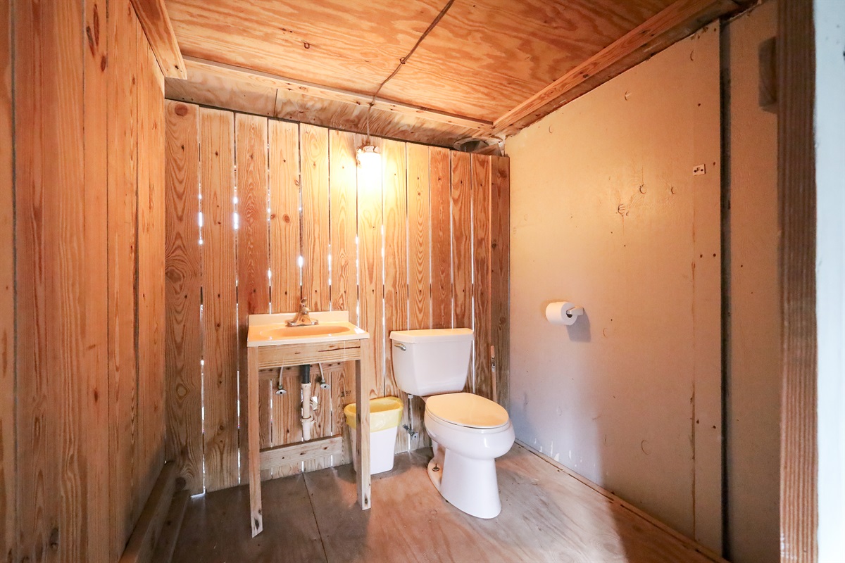 Carport, outside bathroom