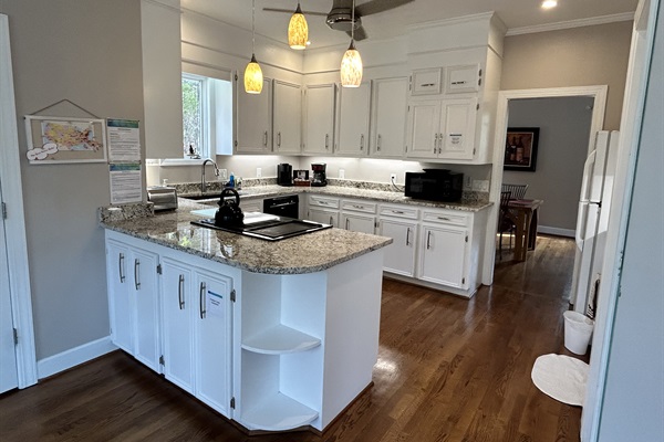 Open, full Kitchen looks out onto Breakfast Nook so the conversations can continue while preparing a meal.