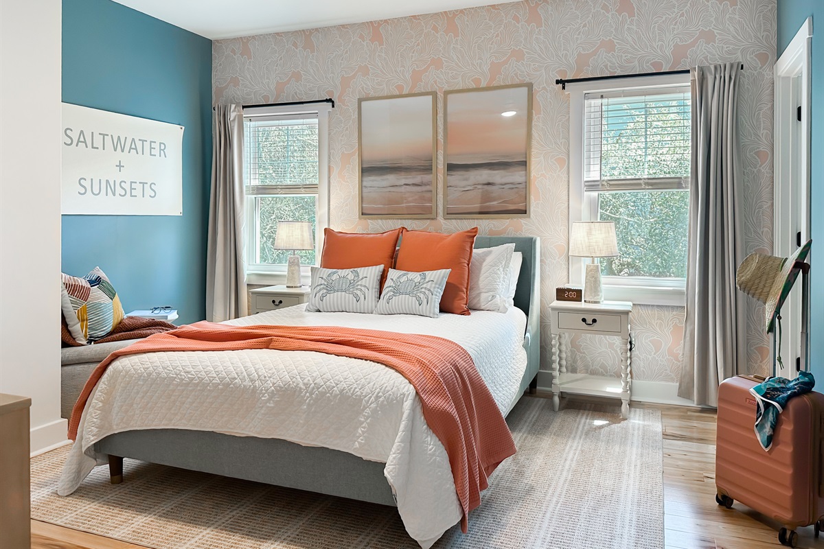 Saltwater + Sunsets Queen Suite has a queen bed.