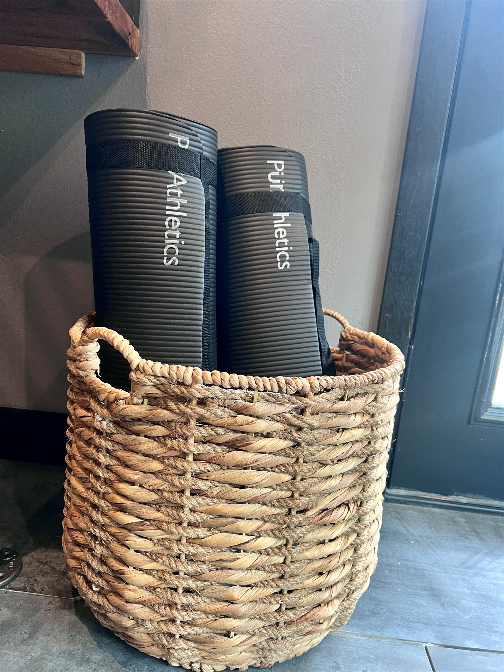 Yoga mats, yoga books, fitness ball and weights.
