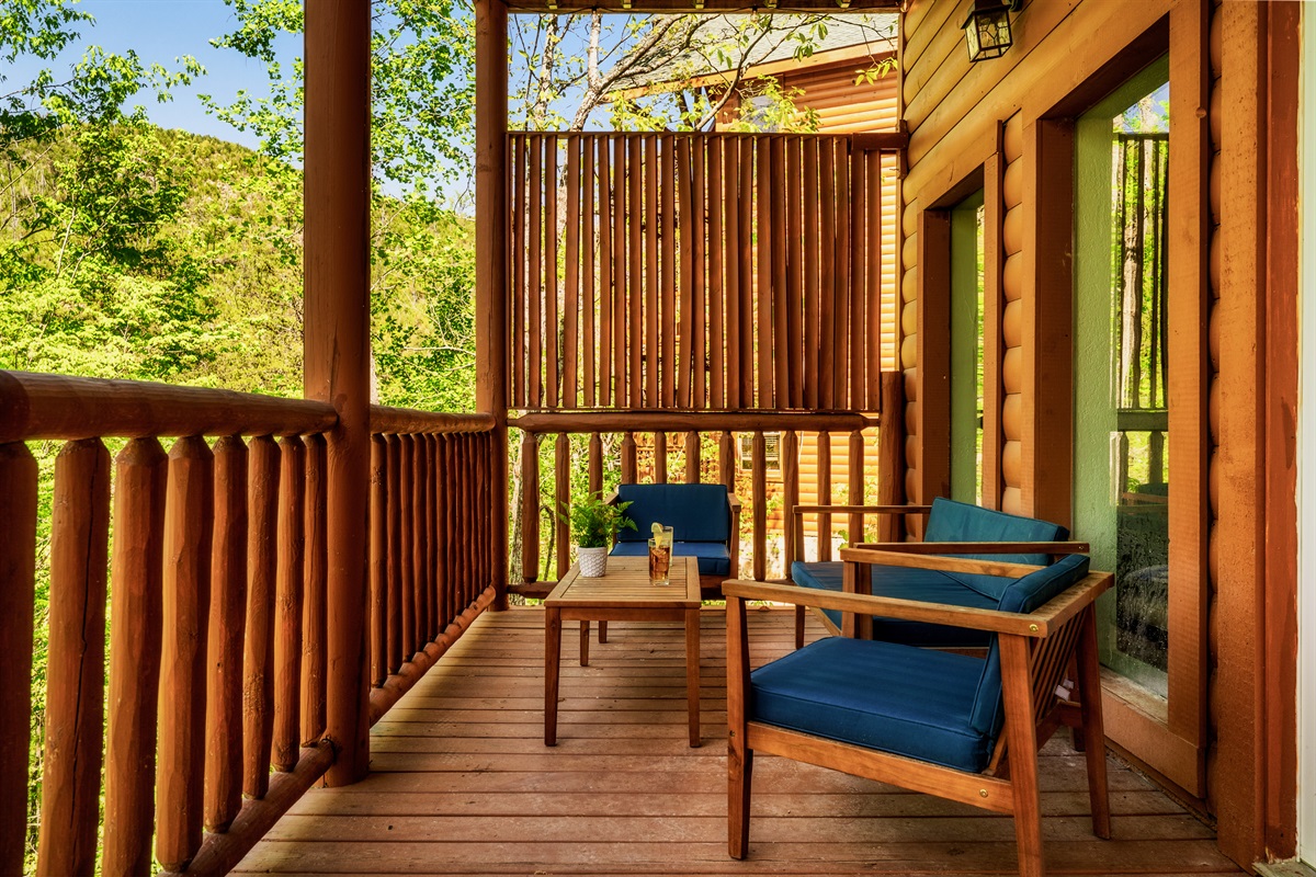 The porch is great for relaxing and enjoying nature's beauty, as there is comfortable sitting available.