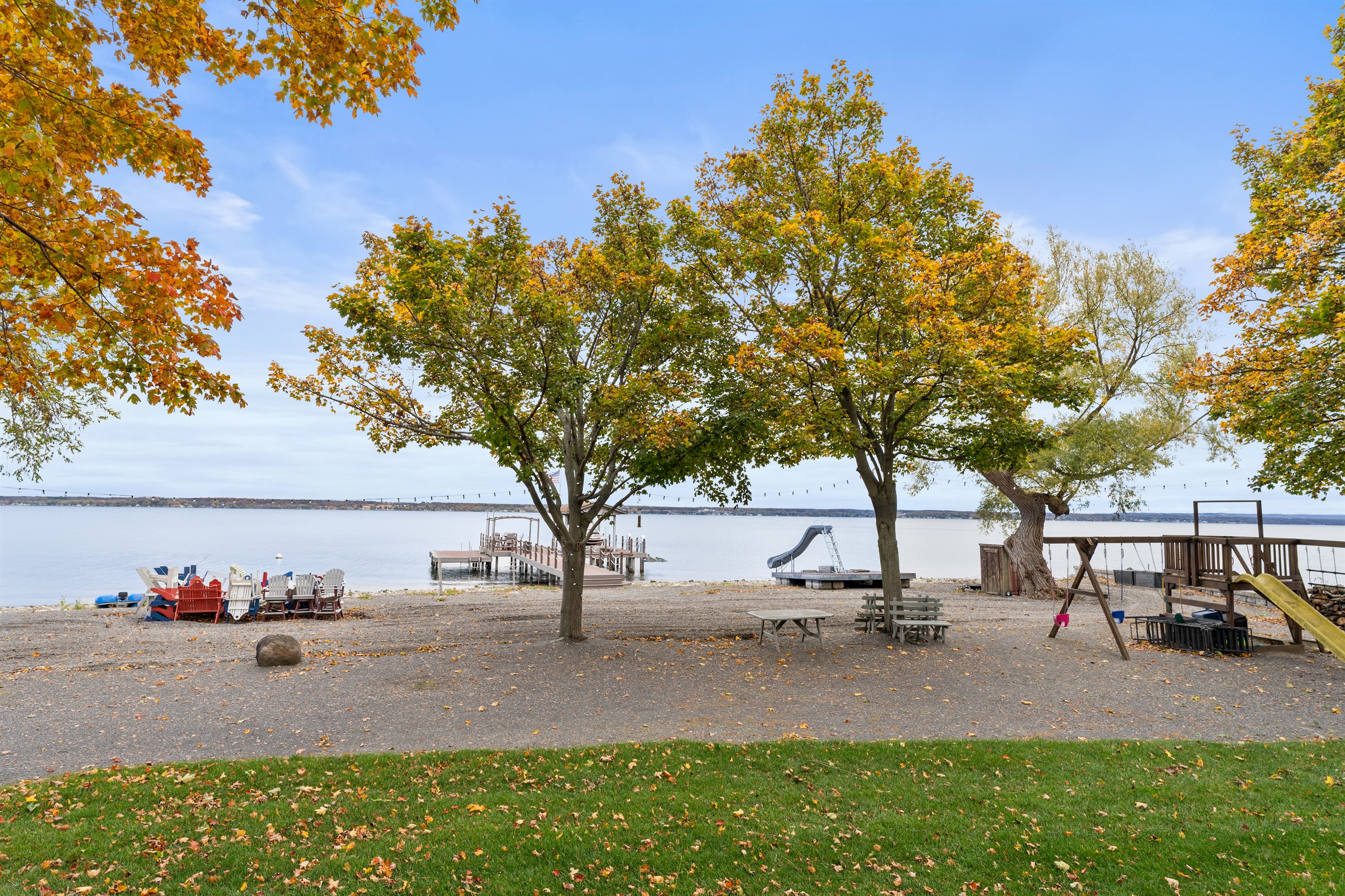 Sandy shoreline and calm waters ideal for swimming and kayaking.
