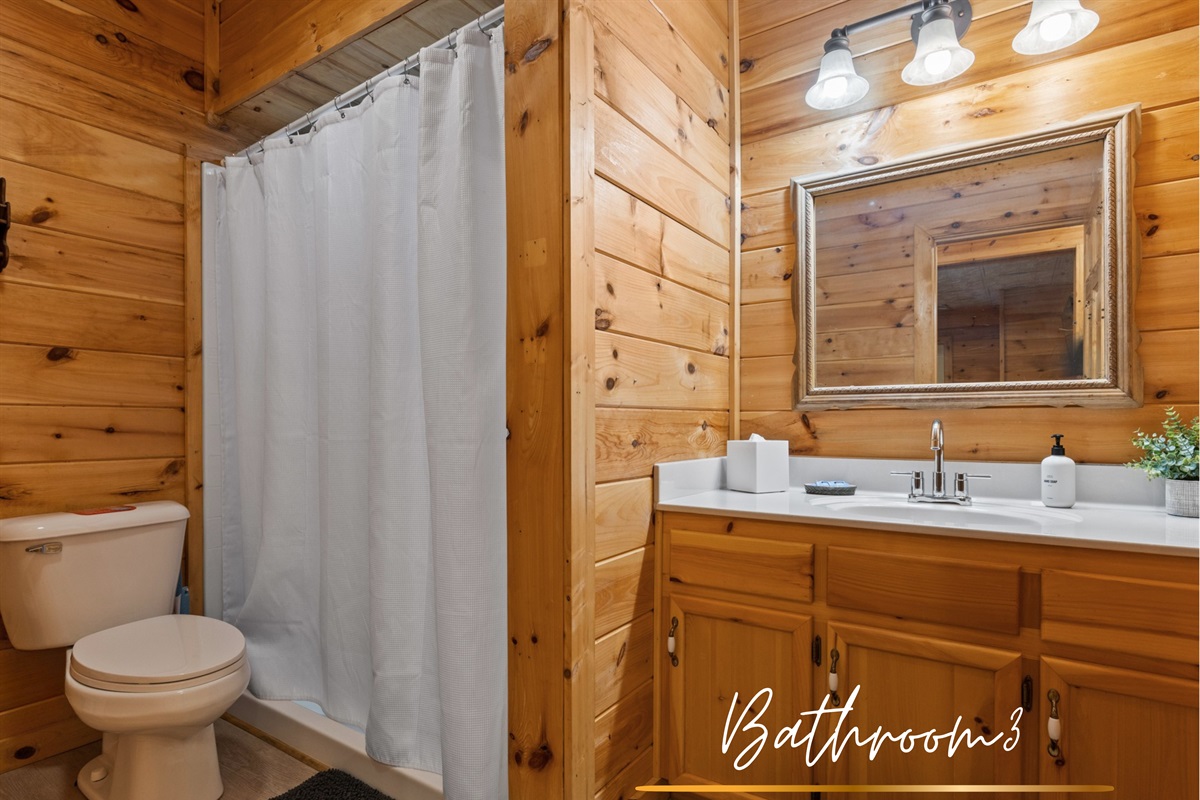 Sleek and rustic... bathroom three is cozy, modern, and functional.