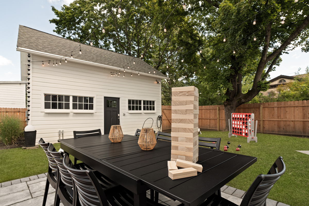 Dinner can turn into game night without ever leaving the table. With seating for 8, backyard views, and giant Jenga close by, this outdoor space was made for spending time together.