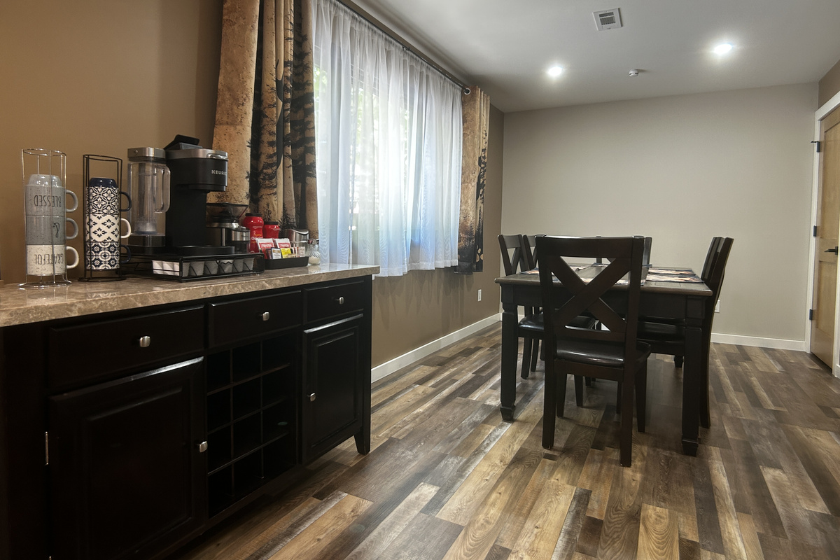 Beverage station has some decaf options available in both coffee and tea. Table provides seating for up to 6 people.