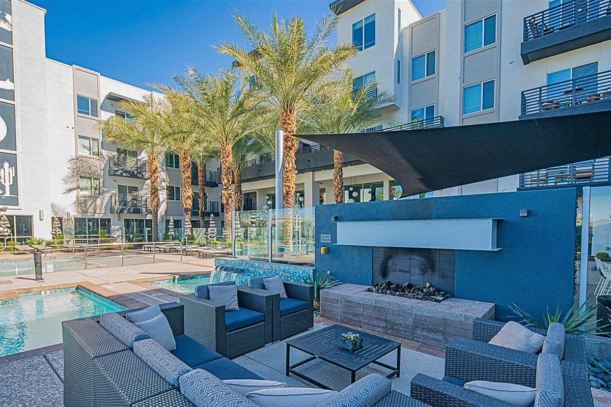 Relaxing oasis! Enjoy the calming water feature and shaded seating.
