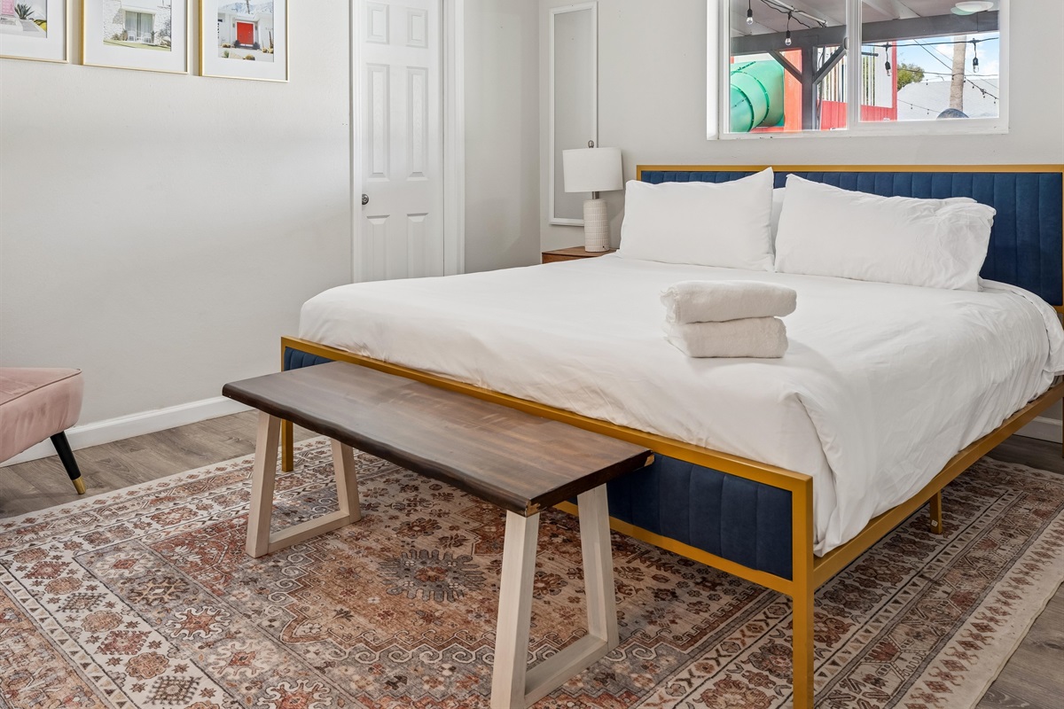 Enjoy the cozy king size bed in the primary bedroom