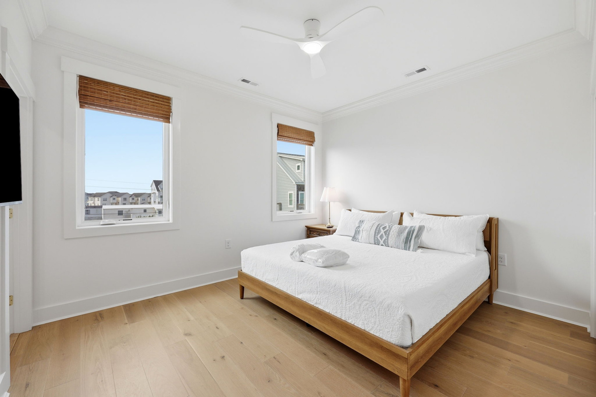 Serene coastal bedrooms filled with natural light and designed for peaceful rest after beach days