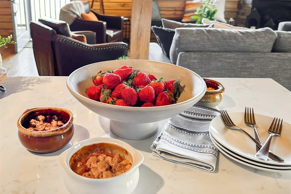 Breakfast is served on the kitchen island.