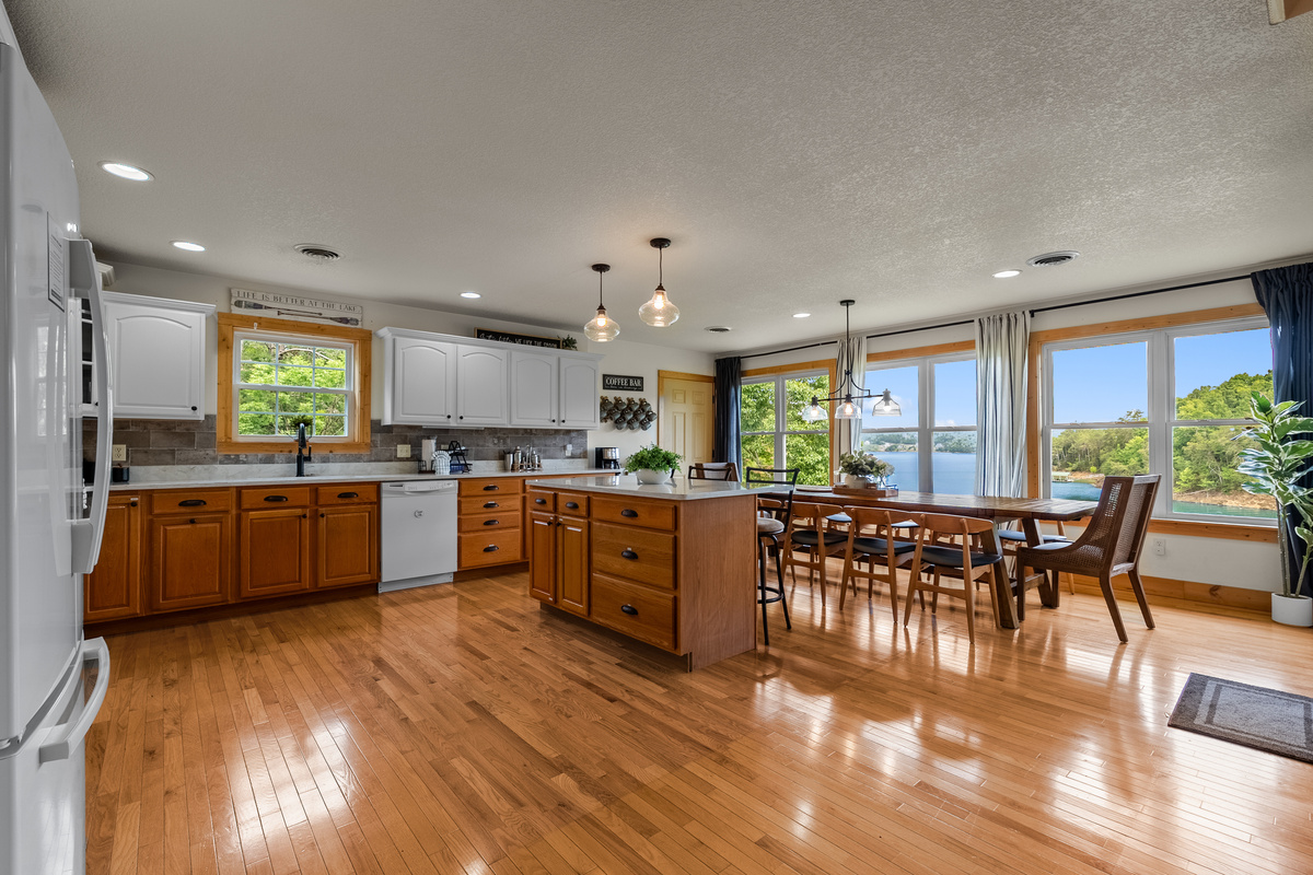 Huge kitchen / living room area with tons of seat for all